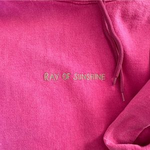 Hot Pink ‘Ray of Sunshine’ Hoodie from Urban Outfitters